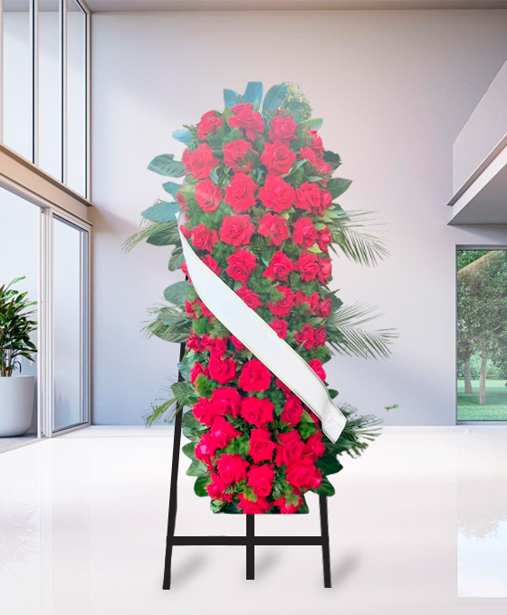 Cuscino funebre di rose rosse Prestige, omaggio floreale da collocare accanto al feretro
