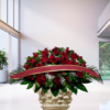 Cuscino funebre di rose rosse classico con nastro per la dedica, composizione funebre a Bologna