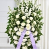 Cuscino funebre di fiori bianchi, omaggio floreale da collocare accanto al feretro