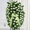 Cuscino funebre di rose bianche e verde di aspidistra con nastro per la dedica, composizione funebre a Bologna